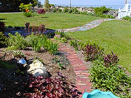 Walkway – Combination of brick & flagstone utilized to match the front entrance.